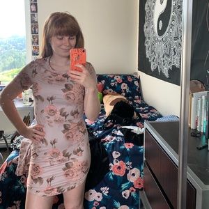 Soft floral form fitting dress.